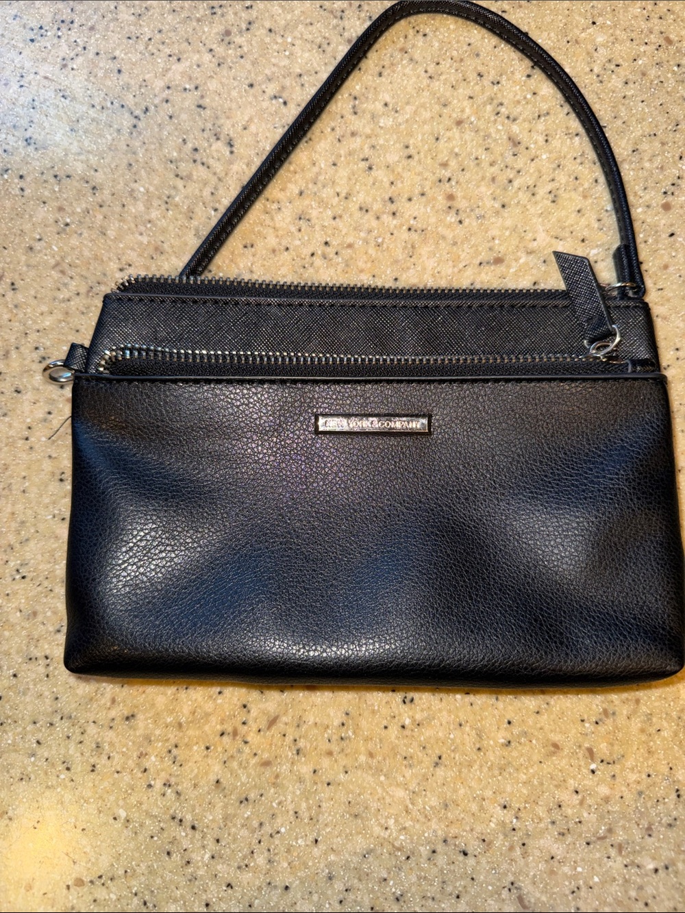 New York & Company Black Wristlet Clutch with Metal Logo